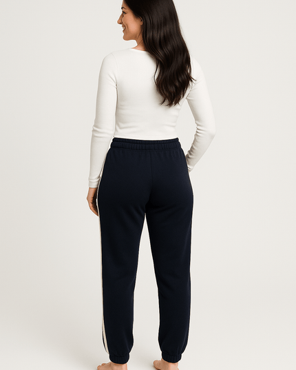 Hummel Fitness Jogginghose in Nachtblau mit silbernen Streifen – Größe XL - Tiz Mode